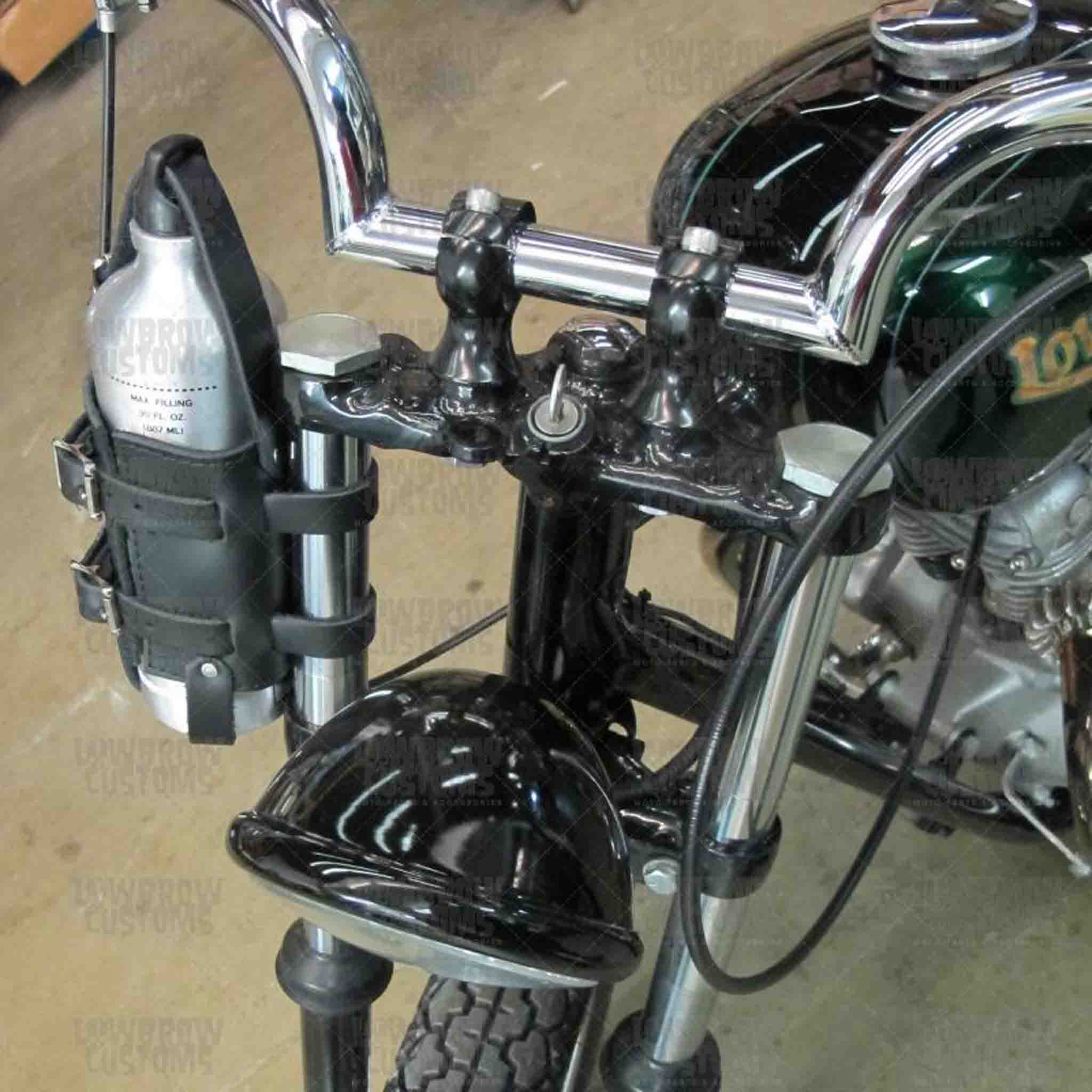 Add a piece of mind to your ride with the FB01 spare fuel gas bottle carrier. Hand crafted in USA with premium leather and top quality hardware. Durable and stylish, it's the perfect fit for your motorcycle.