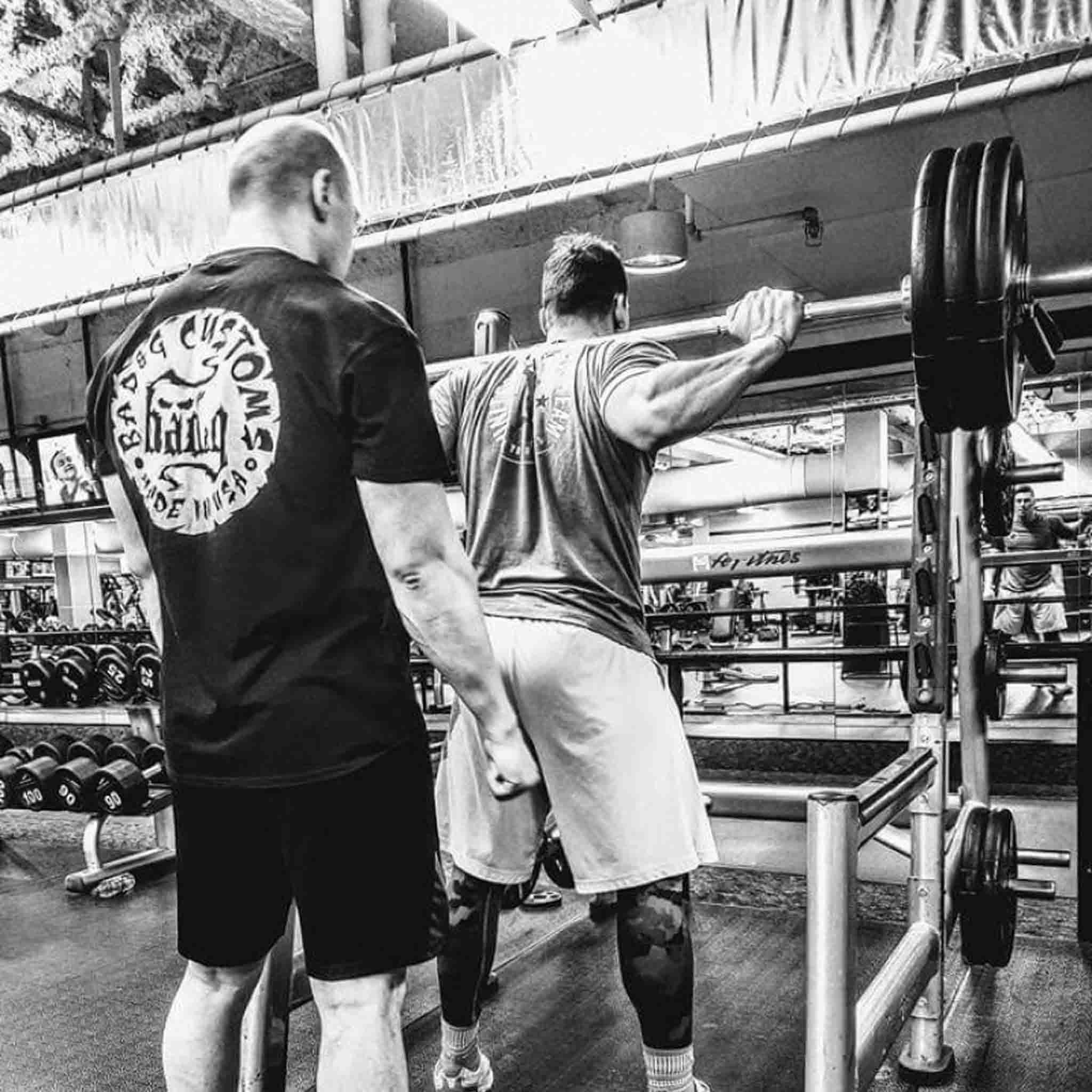 Introducing the BAD&G Shop Shirt – a must-have for any motorcycle enthusiast. Crafted from heavy, 100% cotton, this black Gildan t-shirt delivers a vintage look and feel. Featuring a clear, bold imprint on both the front and back, this shirt combines rugged style with ultimate comfort.