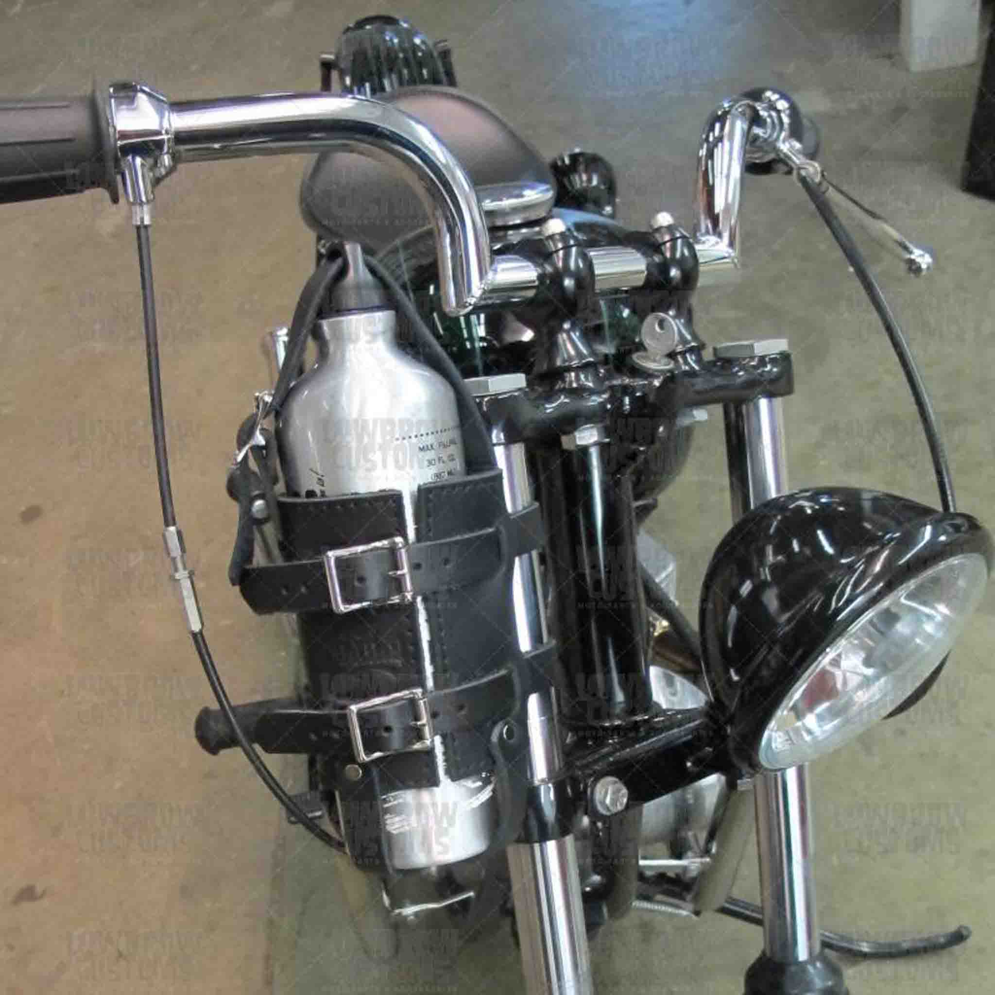 Add a piece of mind to your ride with the FB01 spare fuel gas bottle carrier. Hand crafted in USA with premium leather and top quality hardware. Durable and stylish, it's the perfect fit for your motorcycle.